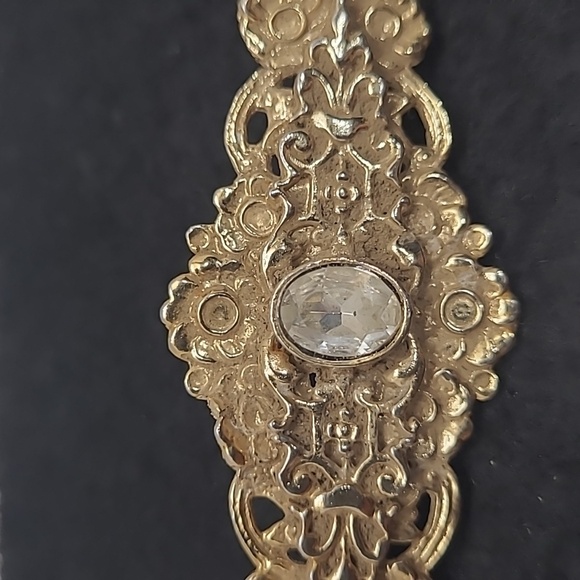 Jewelry - Elegant Gold Floral Brooch with Center Stone